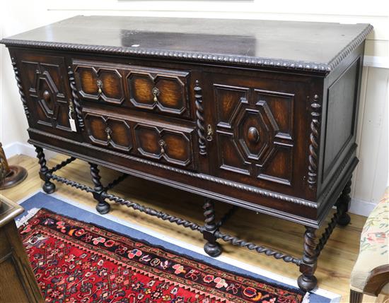 A Jacobean style oak sideboard W:183cm